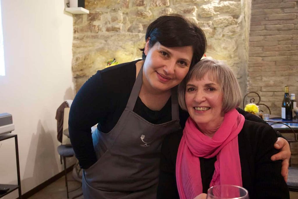 Jane and our waitress at Il Baccannale